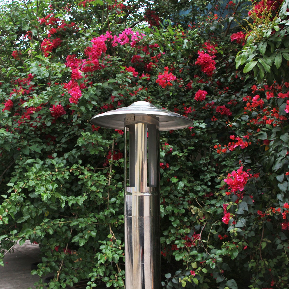 Bropool HT-106 stainless flue terminal detail in an outdoor setting