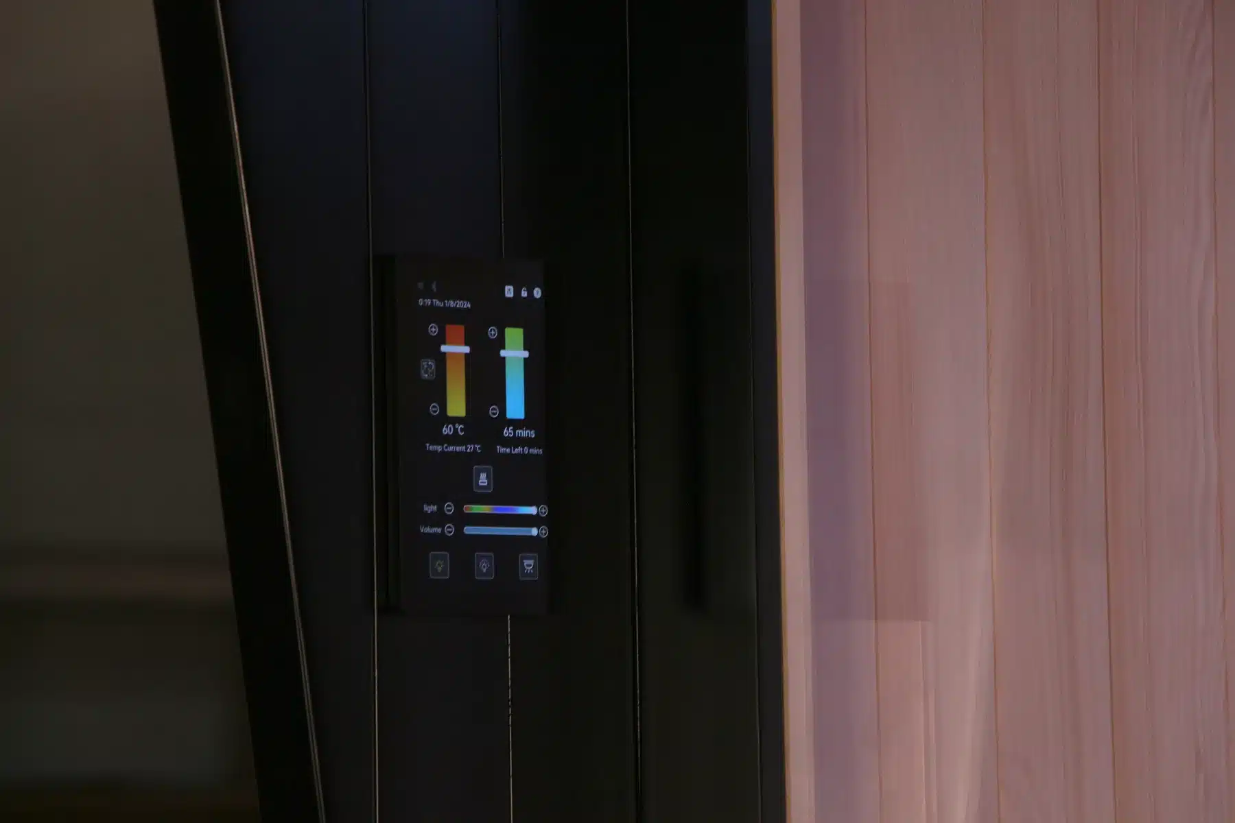 Bropool OS-1200 outdoor sauna control panel mounted beside the wood interior