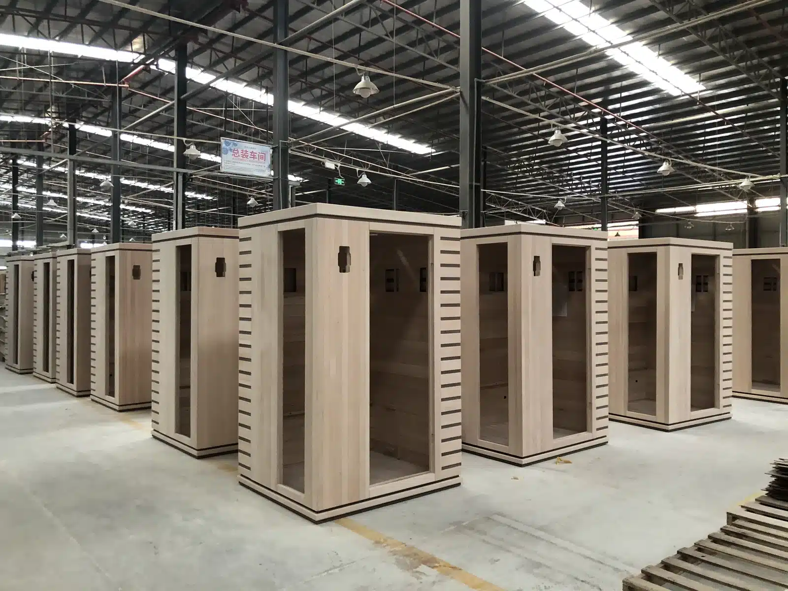 Bropool workshop with sauna cabins and components under preparation