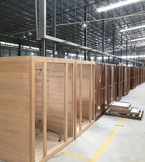 Sauna cabin structures arranged in the Bropool manufacturing facility