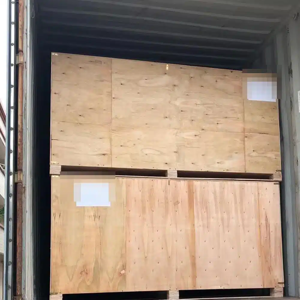 Wooden sauna packages loaded inside a shipping container