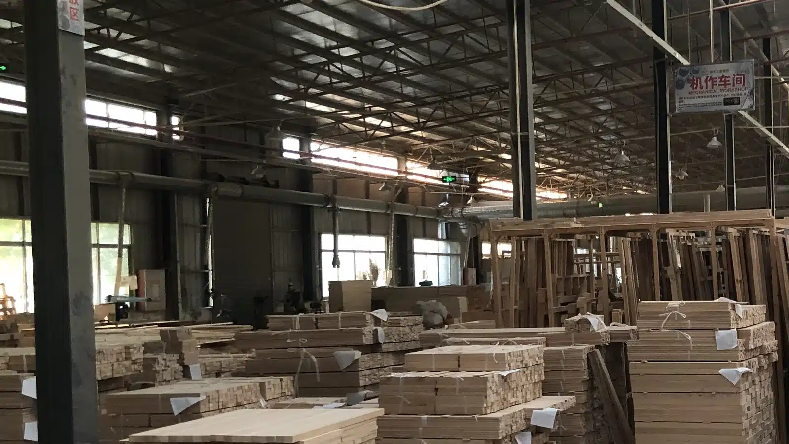 Woodworking machines and timber components inside the Bropool manufacturing facility